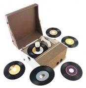 Photo of a record player with several 45s